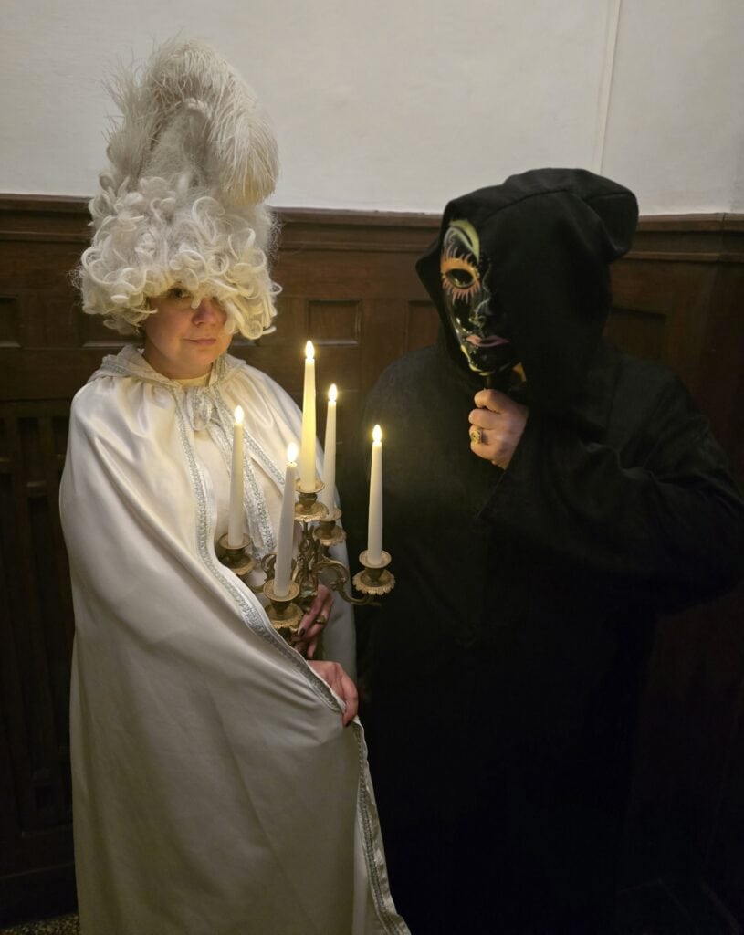 Mask and costume photos with light candlesticks, mafia and parliament theme.