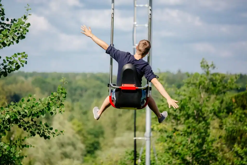 Flying chair for children, leisure play in the garden or in the park.