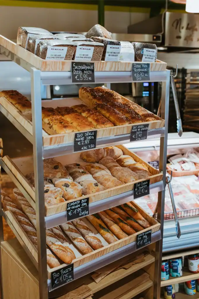 Freshly baked bread and pastries on the shop shelf.